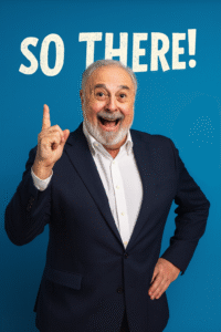 Picture of a bearded man holding up one finger with the caption "So there!"